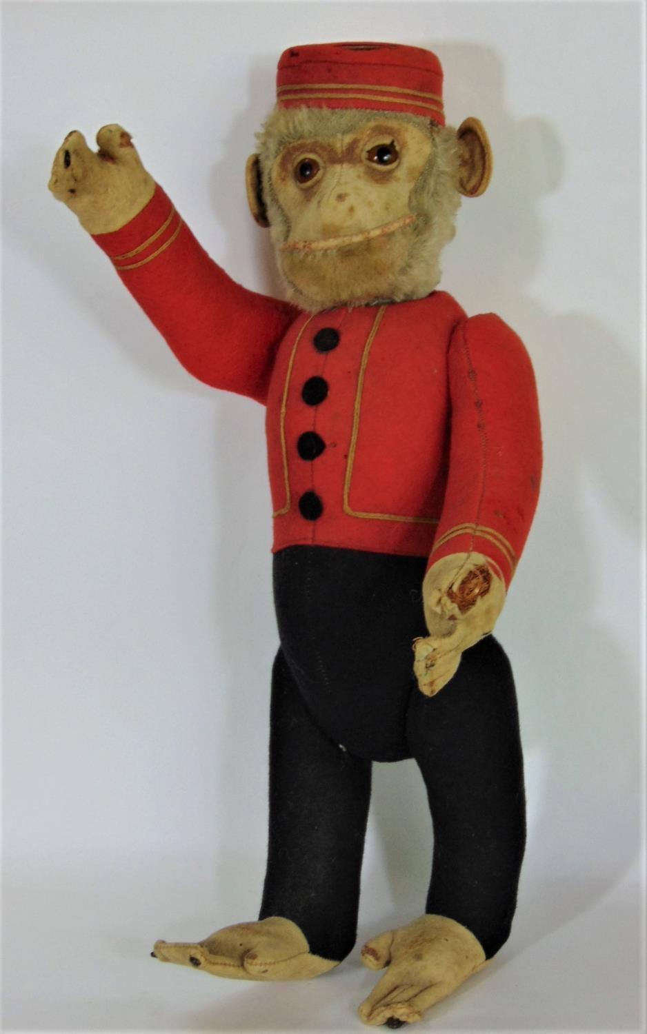 Schucco Bellhop Yes/ No monkey C1920's with brown glass eyes, fur head, felt face, in red and - Image 6 of 11