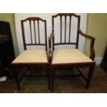 A set of six (4+2) Edwardian mahogany dining chairs in a Sheraton manner with boxwood and ebony