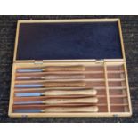 SET OF SIX SHEFFIELD HSS WOOD TURNING CHIZZLES, EACH WITH AN ASH HANDLE, AS NEW, IN A WOOD CASE, 6.5