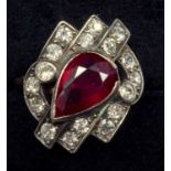 A RUBY AND DIAMOND DRESS RING, PEAR CUT RUBY WEIGHING AN ESTIMATED 2.10CT, SURROUNDED BY OLD CUT
