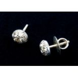 A PAIR OF DIAMOND CLUSTER EAR STUDS, EACH SET WITH SEVEN OLD/TRANSITIONAL CUT DIAMONDS, PAVÉ SET