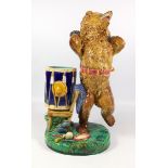 RARE MINTON MAJOLICA MODEL OF A BROWN GLAZED DANCING BEAR, A BLUE DRUM WITH CYMBALS ON A CHAIR BY