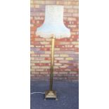 BRASS CORINTHIAN COLUMN STANDARD LAMP WITH A FLUTED COLUMN , ON A SQUARE BASE, FOUR CLAW FEET (H.