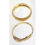 18 CT GOLD RING WITH CARVED DECORATION 6.1 GRAMS AND A 9 CT GOLD CROSSOVER RING WITH PIERCED
