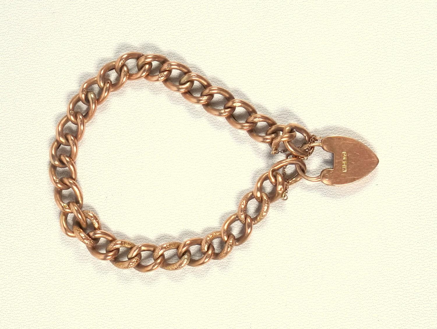 9 CT GOLD FANCY CURB LINK BRACELET WITH PADLOCK CLASP, 9 GRAMS