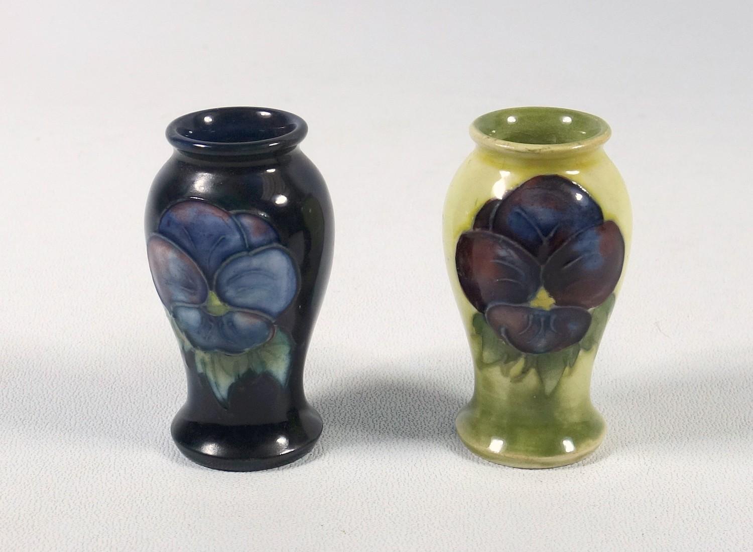 MOORCROFT EARTHENWARE MINIATURE BALUSTER VASE PAINTED WITH TWO NASTURTIUMS ON A DARK BLUE GROUND (H. - Image 2 of 3