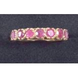 9 CT GOLD HALF ETERNITY RING SET SEVEN RUBIES, GROSS 2.5 GRAMS