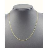 ITALIAN YELLOW METAL FINE FLAT CURB-LINK NECKLACE, STAMPED 750, 6.9 GRAMS