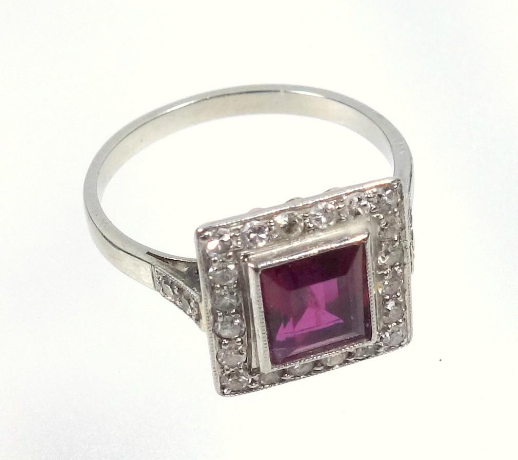 WHITE METAL RING SET RECTANGULAR CUT RUBY STONE 7 X 6 MM AND TWENTY FOUR DIAMONDS, STAMPED 'PLAT', - Image 3 of 5