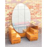 LATE ART DECO GOM STYLE OAK DRESSING TABLE, WITH AN OVAL MIRROR BACK, GLASS TOP AND STEPPED SIDES,