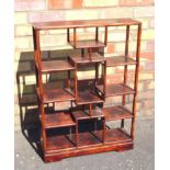 JAPANESE STAINED WOOD DISPLAY SHELVES WITH A STEPPED DESIGN, ON BRACKET FEET, (H. 77.4 CM, W. 55.4