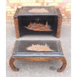 CHINESE EBONISED CAMPHOR LINED CHEST, THE HINGED TOP AND FRONT CARVED WITH FIGURES, BOAT AND