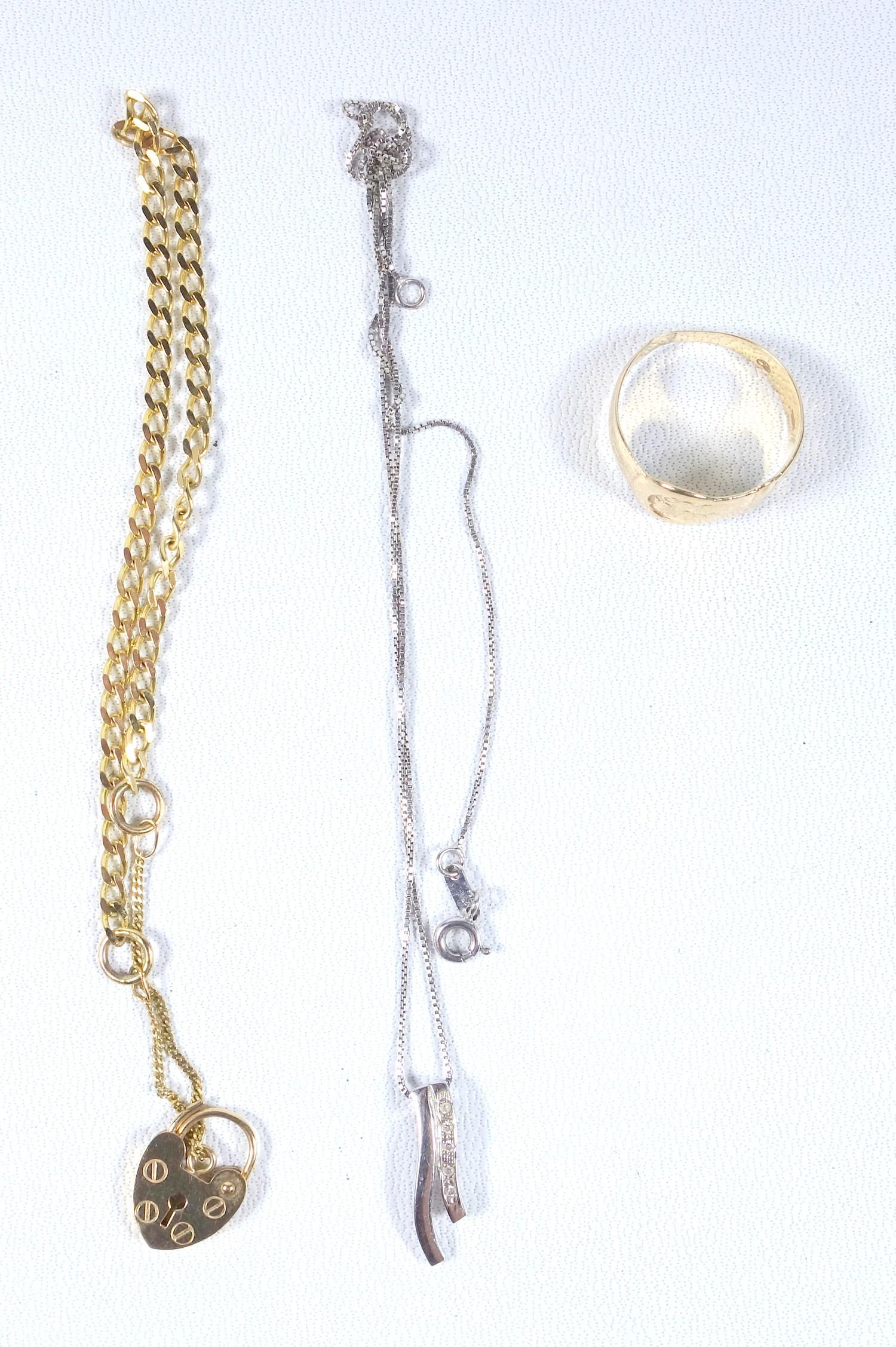 9 CT GOLD PENDANT SET FIVE DIAMONDS ON 9 CT CHAIN, 9 CT PADLOCK CLASP ON GILT CHAIN AND A 9 CT