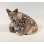 ROYAL COPENHAGEN GROUP OF A FOX WITH FOUR CUBS PAINTED IN NATURALISTIC HUES, SIGNED WITH THE