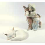 ROYAL COPENHAGEN PORCELAIN MODEL OF A CAT CURLED UP ASLEEP, SIGNED WITH THE INITIAL 'W' AND NUMBERED