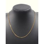 YELLOW METAL FINE FLAT CURB LINK NECKLACE, STAMPED 750, 10.1 GRAMS
