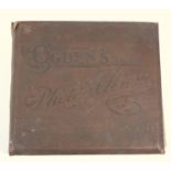 OGDEN'S PHOTO ALBUM CONTAINING THIRTY-TWO PINNACE PHOTO CARDS AND OGDEN'S CIGARETTE CARDS,