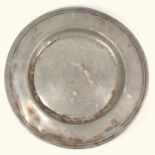 EARLY 18TH CENTURY PEWTER CIRCULAR PLATE, THE RIM ENGRAVED WITH THE INITIAL 'K' WITH 1719 BELOW, AND