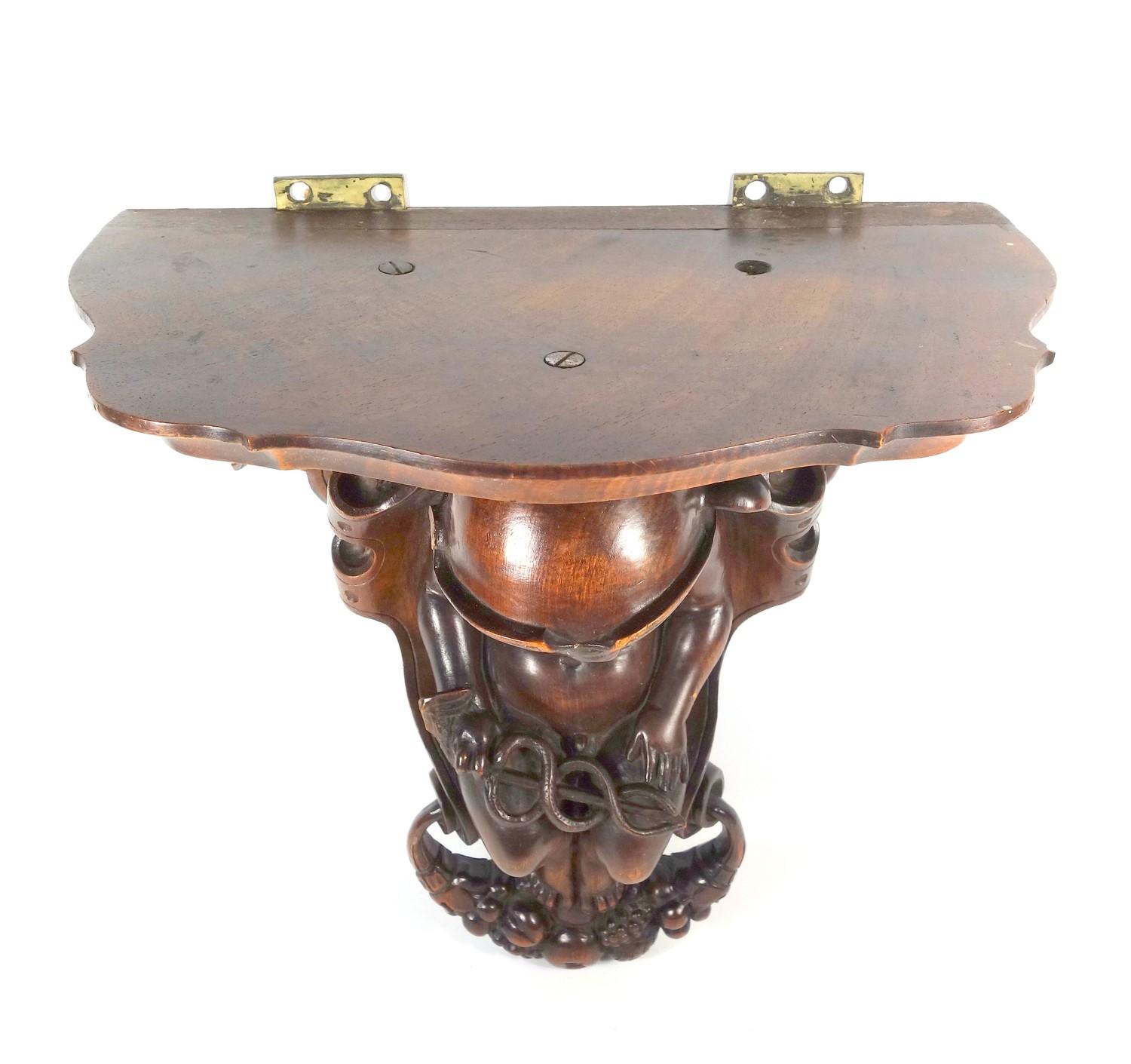 19TH CENTURY ITALIAN CARVED WALNUT WALL BRACKET WITH A FIGURE OF MERCURY SEATED AND HOLDING A - Image 3 of 9