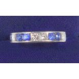 WHITE GOLD RING SET SIX SAPPHIRES (3/4 CARAT APPROX. AND FOUR DIAMONDS 1/2 CARAT APPROX.)