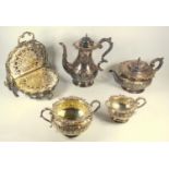 A VICTORIAN FINE SILVER PLATED TEA AND COFFEE SET OF CIRCULAR BALUSTER FORM WITH CHASED AND EMBOSSED