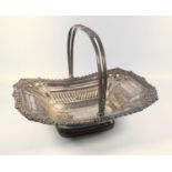 A REGENCY OLD SHEFFIELD PLATED SHAPED RECTANGULAR BASKET WITH FLUTED DECORATION WITHIN A FLORAL