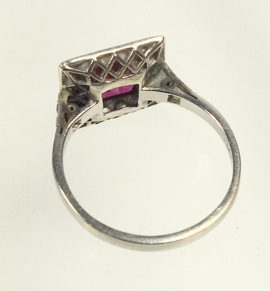 WHITE METAL RING SET RECTANGULAR CUT RUBY STONE 7 X 6 MM AND TWENTY FOUR DIAMONDS, STAMPED 'PLAT', - Image 4 of 5