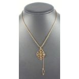 EDWARDIAN 9 CT GOLD OPENWORK PENDANT SET AQUAMARINE AND SEED PEARLS ON A 9 CT CHAIN, WITH SAFETY