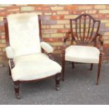 HEPPLEWHITE STYLE CARVED MAHOGANY OPEN ARMCHAIR WITH A BELLFLOWER SPLAT ARCHED SHIELD BACK AND