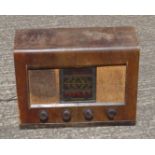 BUSH TYPE A.C. 11 TABLE RADIO IN A WALNUT CASE (H.37.5 CM, W. 49.8 CM)