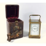 EARLY 20TH CENTURY FRENCH CARRIAGE CLOCK WITH A WHITE ENAMEL DIAL ENCLOSING AN EIGHT DAY MOVEMENT,
