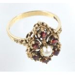 9 CT GOLD RING SET SIX GARNETS AND CULTURED PEARL, 3.5 GRAMS
