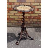 19TH CENTURY CONTINENTAL CARVED ELM TABLE/FIRESCREEN WITH A GILDED FLORAL NEEDLEWORK PANELLED