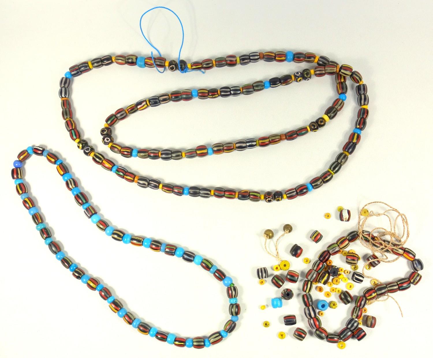 SARAWAK POLYCHROME GLASS BEAD NECKLACE (L. 150 CM APPROX.), A SHORTER BEAD NECKLACE (L. 65 CM