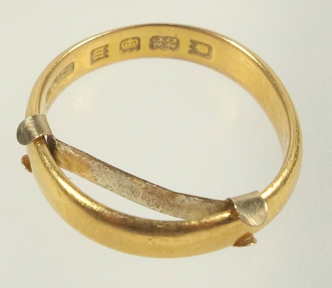 22 CT GOLD WEDDING RING BY L W & CO., LONDON 1927, 3.8 GRAMS, WITH A 9 CT SPACER (2)