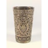 19TH CENTURY INDIAN KUTCH SILVER TAPERING CYLINDRICAL BEAKER WITH PIERCED FLORAL AND SCROLL