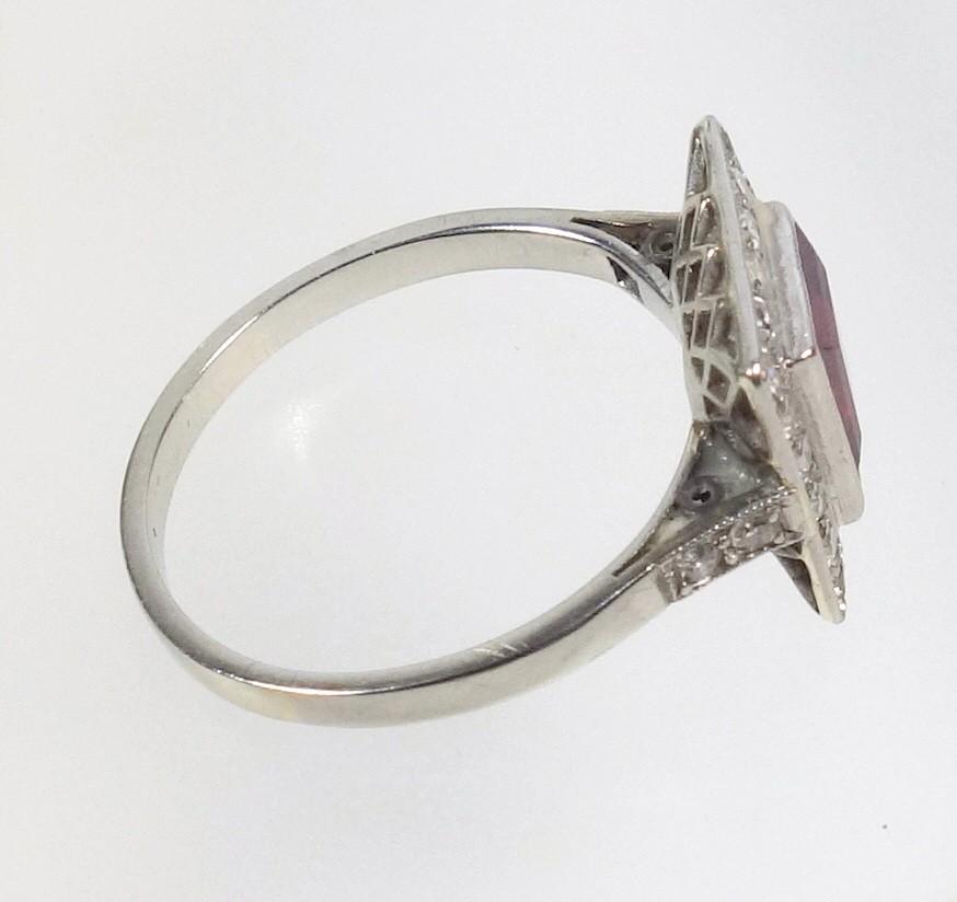 WHITE METAL RING SET RECTANGULAR CUT RUBY STONE 7 X 6 MM AND TWENTY FOUR DIAMONDS, STAMPED 'PLAT', - Image 5 of 5