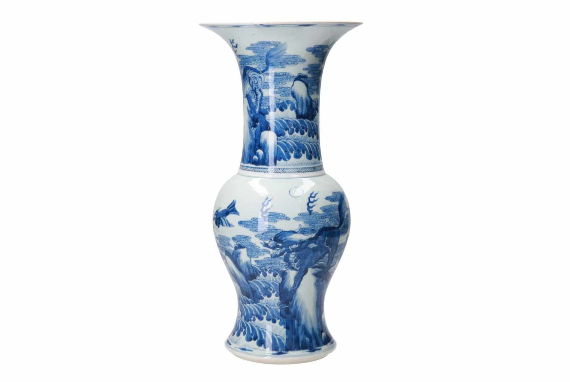 A blue and white porcelain yen yen vase, decorated with kylins and birds in an ocean landscape