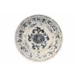 A blue and white porcelain deep charger, decorated with flowers. Unmarked. Vietnam (Annam), 15th/