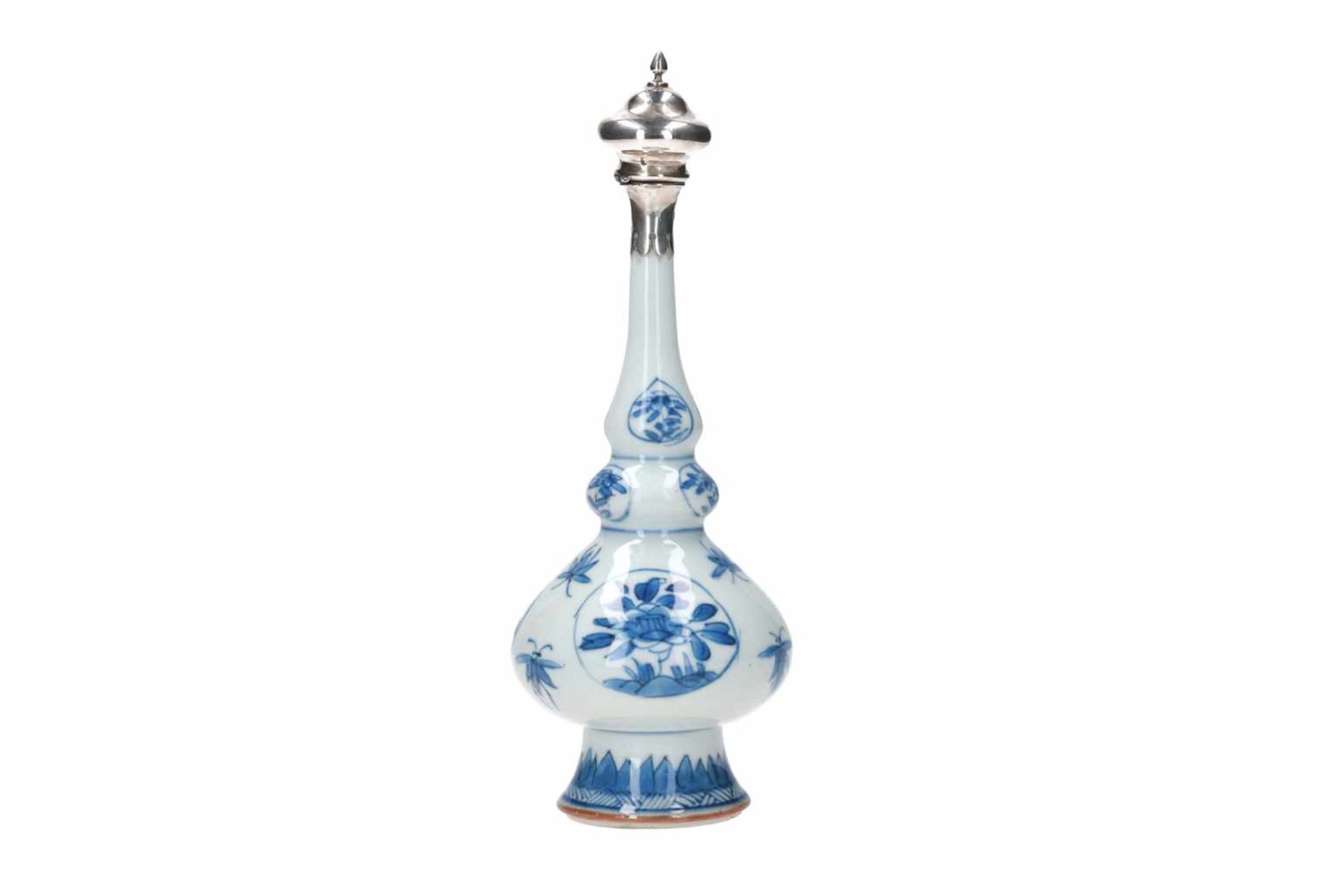 A blue and white porcelain sprinkler vase with silver mounting, decorated with flowers and