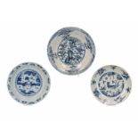 Lot of three blue and white Swatow porcelain chargers, decorated with flowers and animals. One