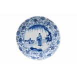 A lobed blue and white porcelain deep dish with scalloped rim, decorated with a dignitary and