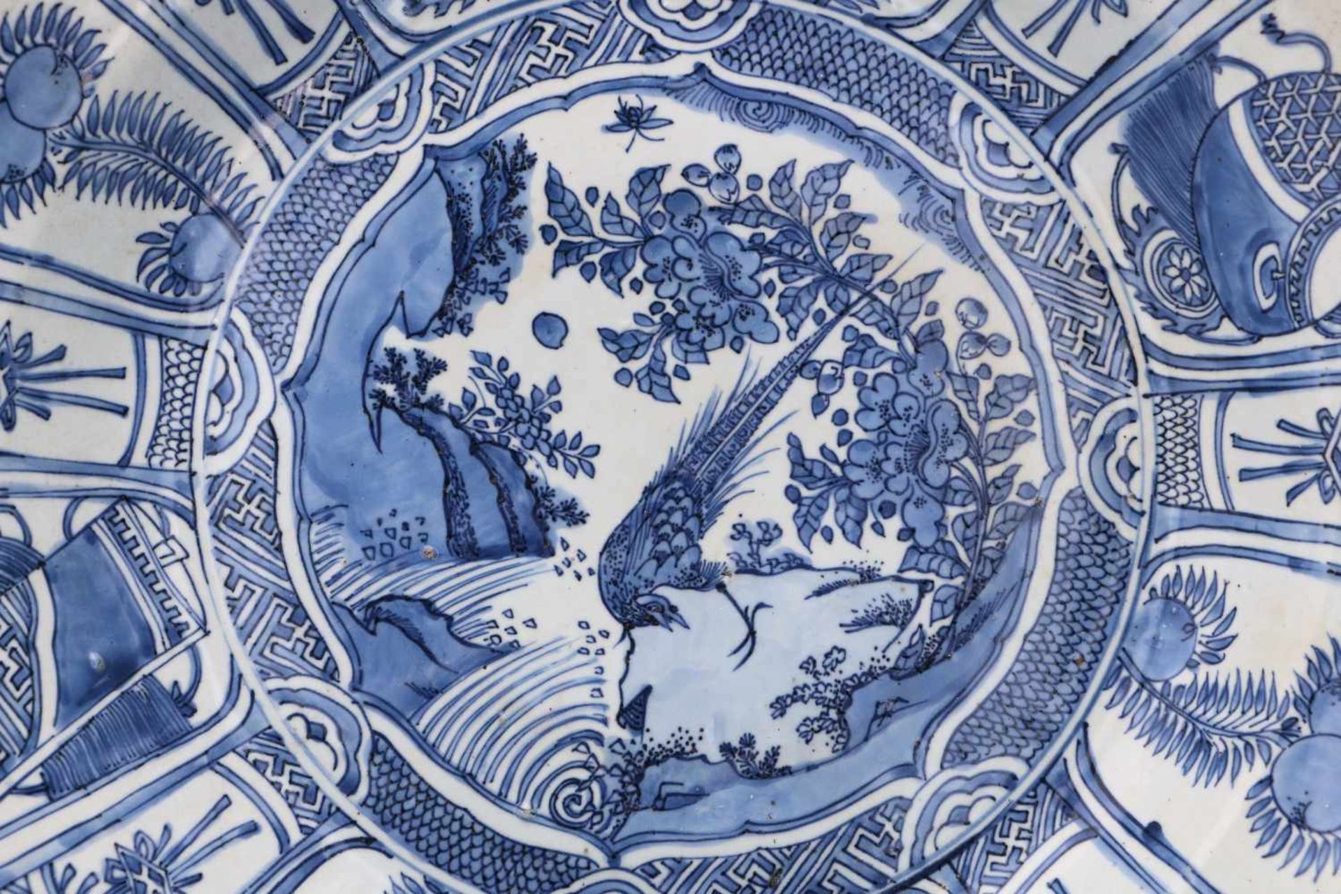 A blue and white 'kraak' porcelain deep charger, decorated with a silver pheasant, fruits, - Image 3 of 3