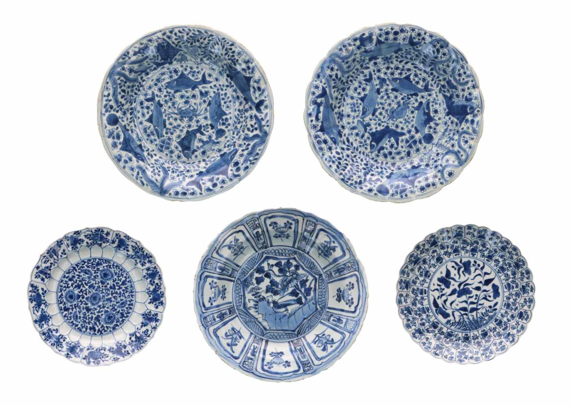 Lot of blue and white porcelain dishes, 1) with scalloped rim, decorated with flowers. Marked with
