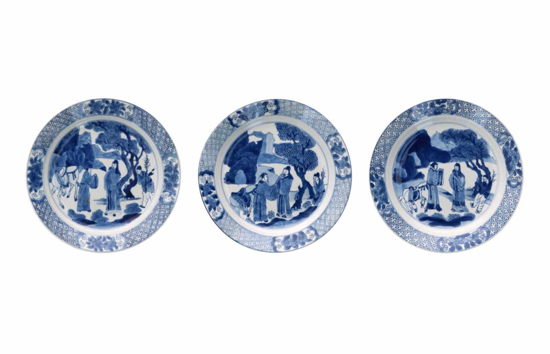 A set of three blue and white porcelain dishes, decorated with figures and a horse. Marked with 6-