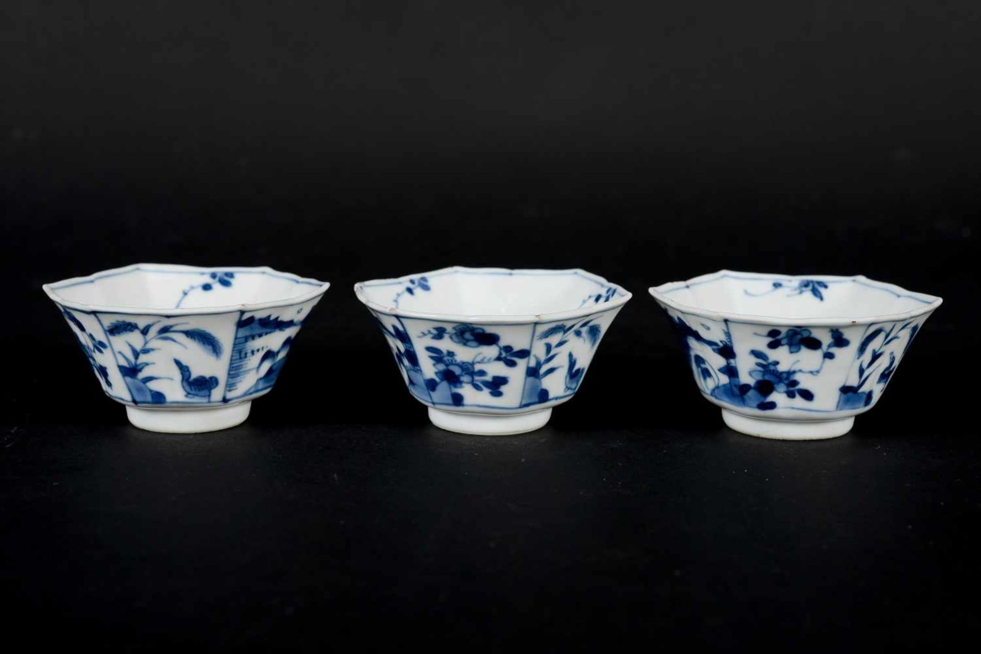 A set of three hexagonal blue and white porcelain cups with saucers, decorated with ducks, flowers - Image 9 of 12