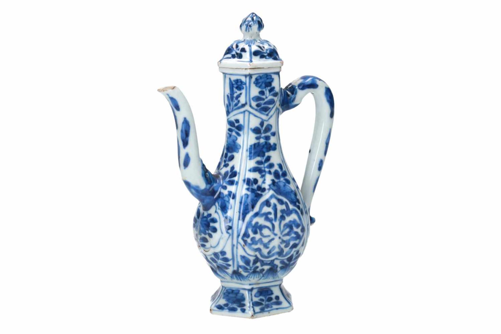 A hexagonal blue and white porcelain wine jar for the Persian market, decorated with flowers and a