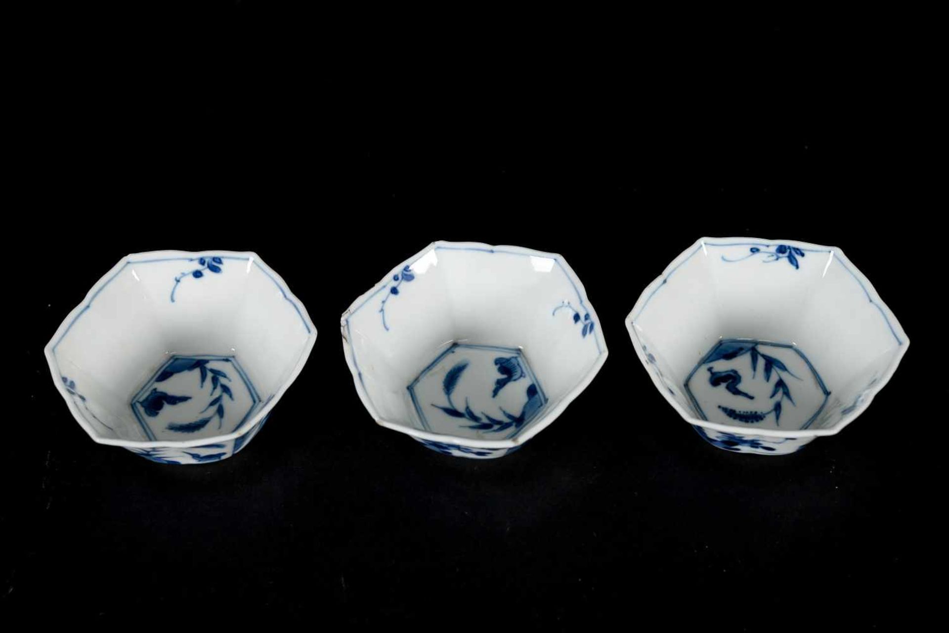 A set of three hexagonal blue and white porcelain cups with saucers, decorated with ducks, flowers - Image 10 of 12