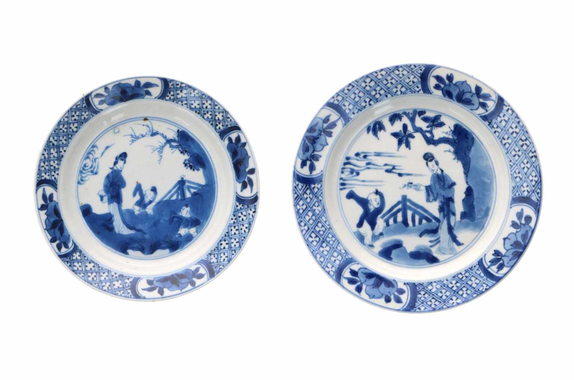 Lot of two blue and white porcelain saucers, decorated with long Eliza and little boys. Marked