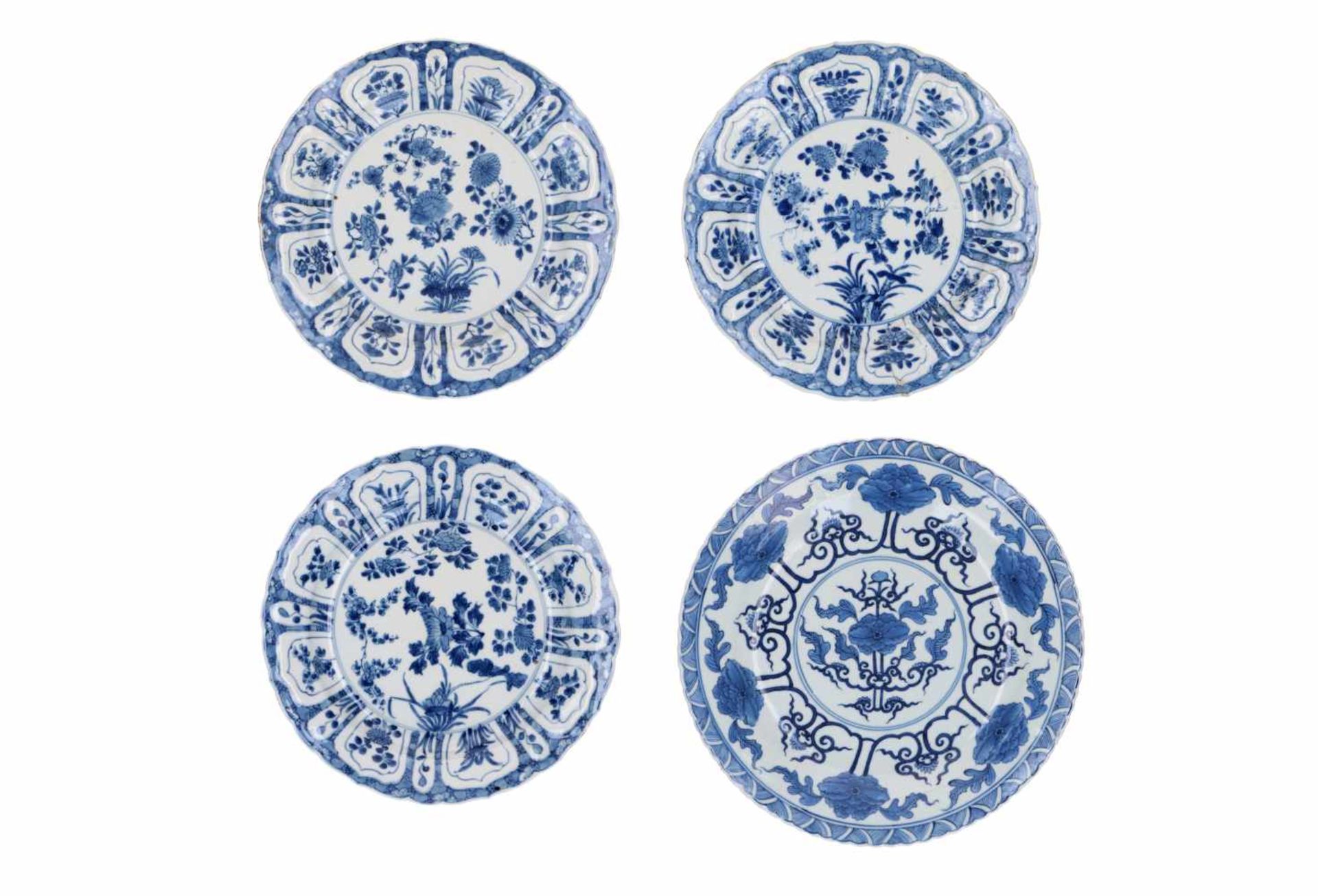 A set of three blue and white porcelain dishes, decorated with flowers. Marked with 6-character mark